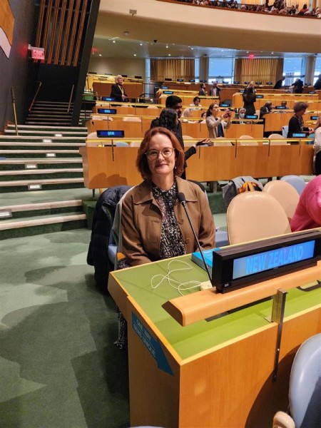 Kellie Coombes sitting at New Zealand's United Nations seat in New York